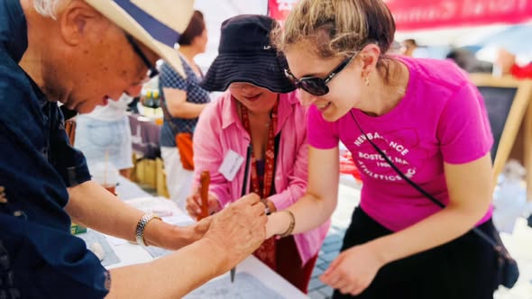 SOPMCA Calligraphy Activity at WWP Market — photo 2