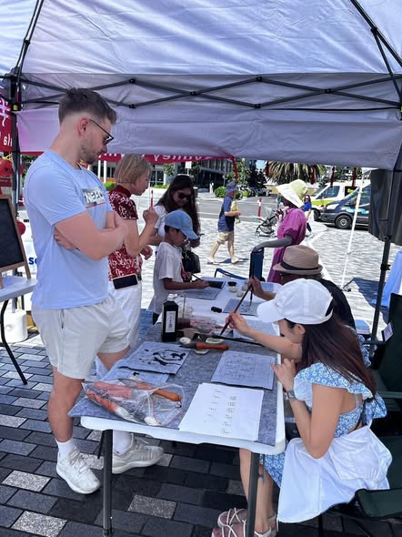 SOPMCA Calligraphy Activity at WWP Market — photo 5
