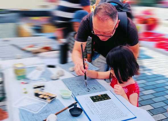 SOPMCA Calligraphy Activity at WWP Market — photo 3